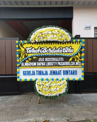 Papan Bunga Duka di Bibida